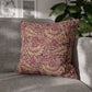 Decorative pillow with a leaf pattern on a gray sofa