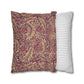 Two pillows, one with a floral pattern and the other with a striped pattern, on a white background.