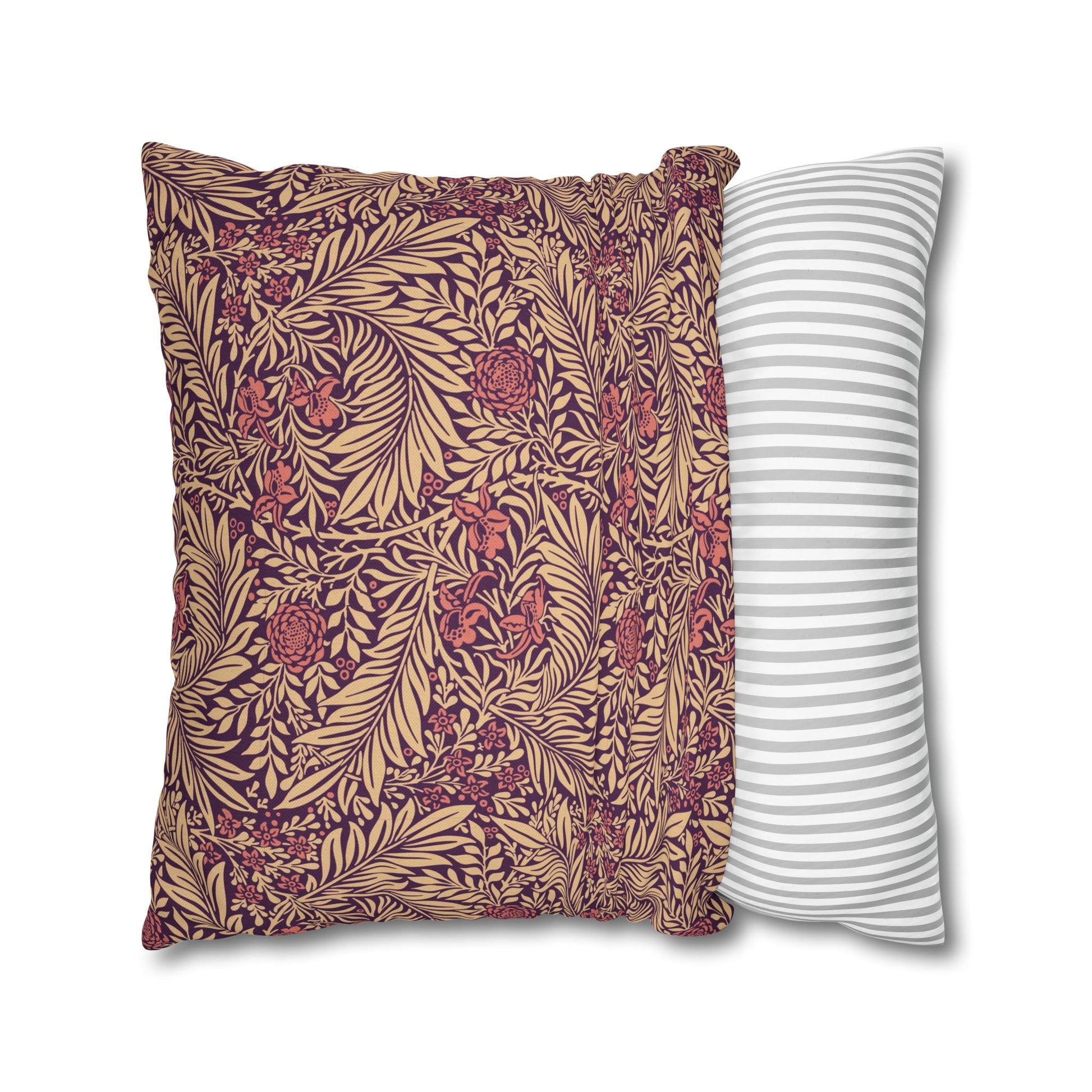 Two pillows, one with a floral pattern and the other with a striped pattern, on a white background.