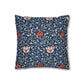 Decorative pillow with floral pattern on a blue background