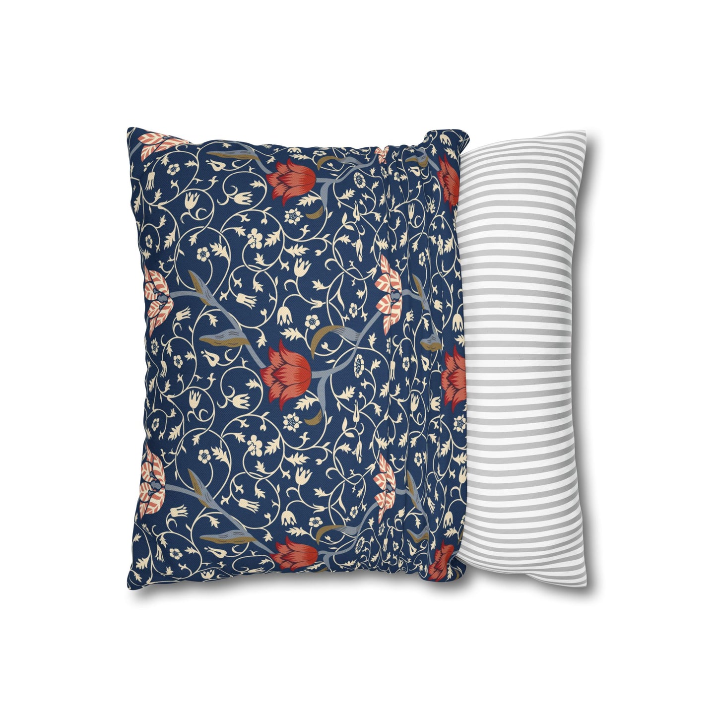 Floral-patterned pillow and a striped pillow on a white background