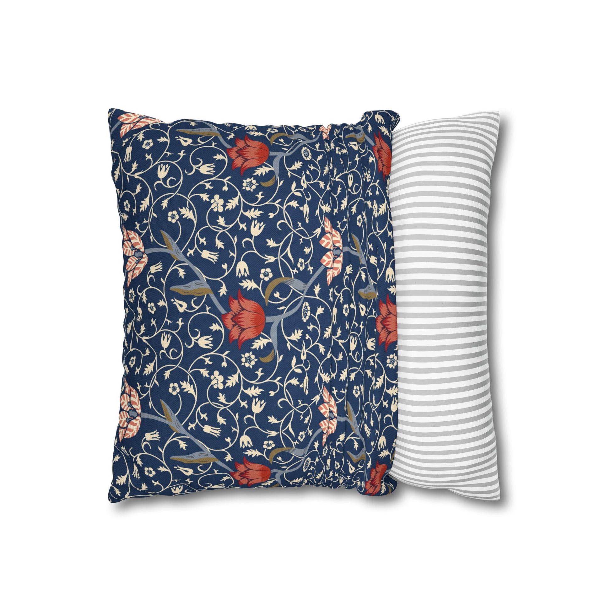 Floral-patterned pillow and a striped pillow on a white background