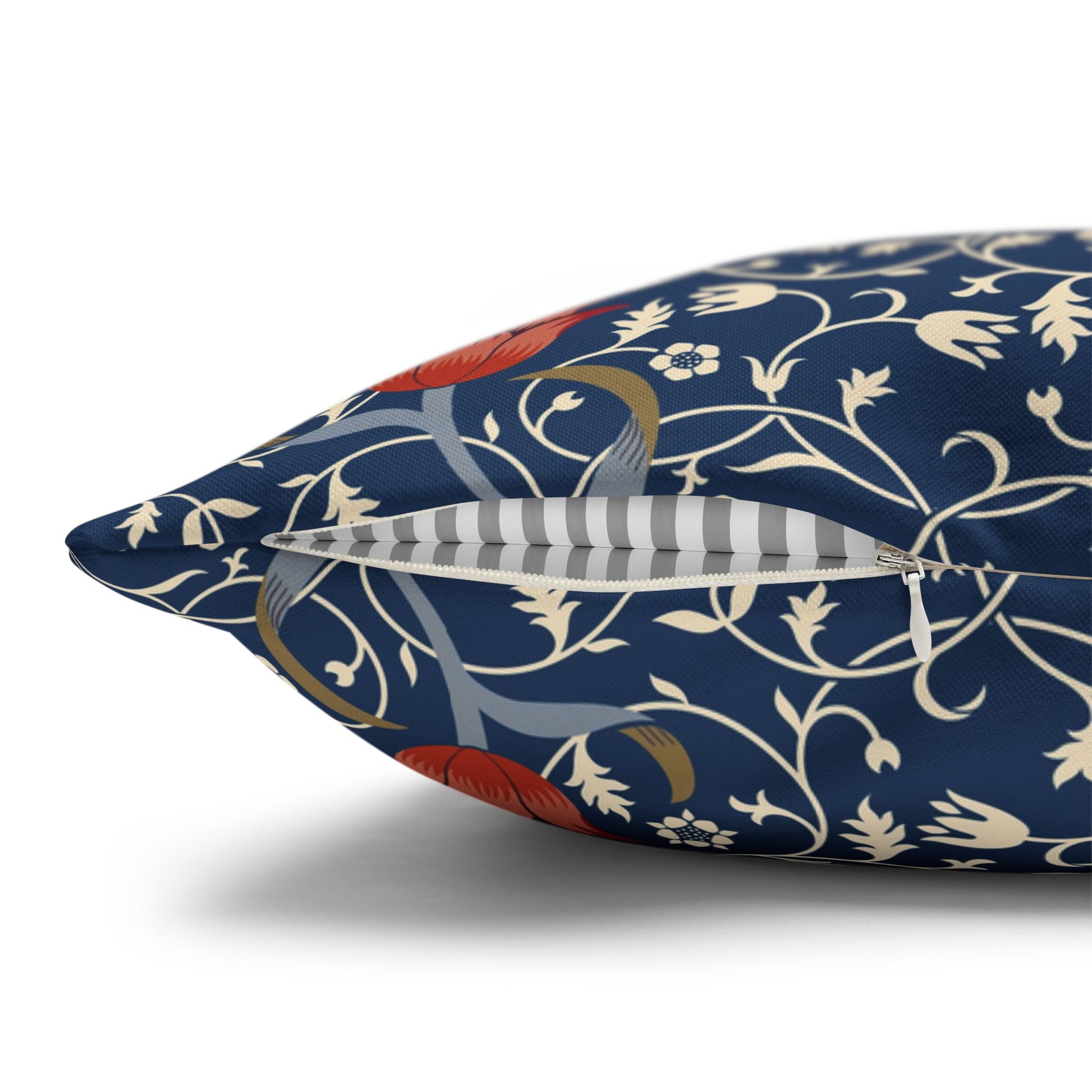 Decorative pillow with floral pattern on a white background