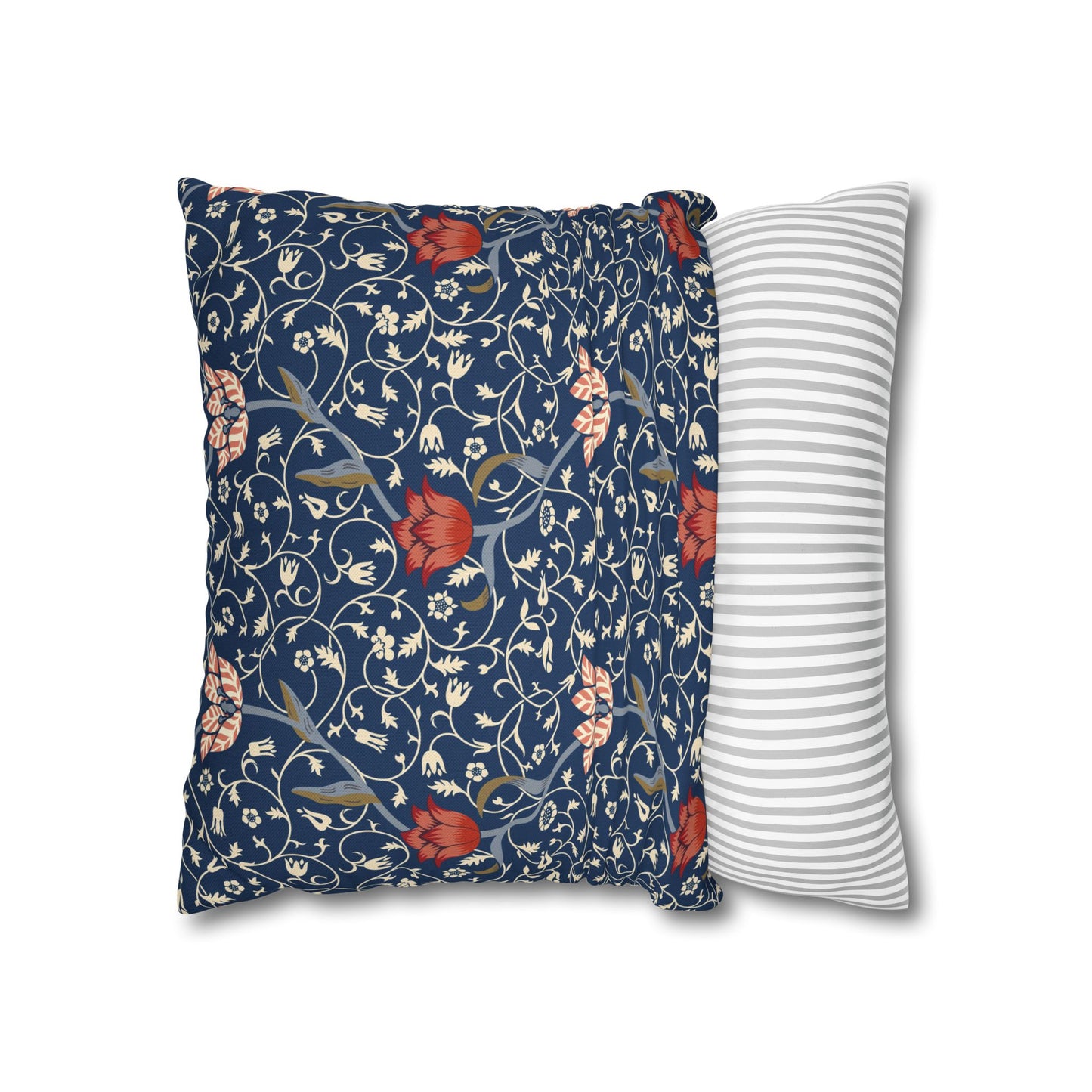 Floral-patterned pillow and a striped pillow on a white background