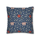 Decorative pillow with floral pattern on a blue background
