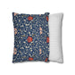 Floral-patterned pillow and a striped pillow on a white background