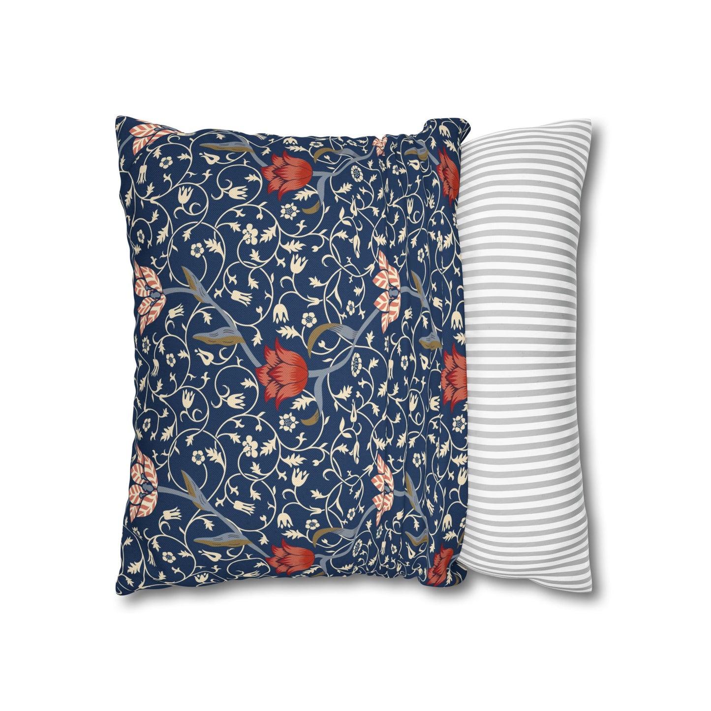 Floral-patterned pillow and a striped pillow on a white background