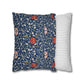 Two pillows, one with floral pattern and one with stripes, on a white background