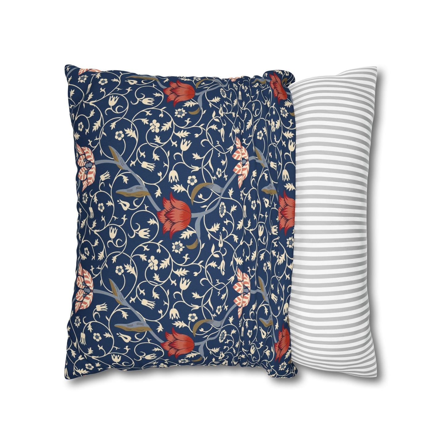 Two pillows, one with floral pattern and one with stripes, on a white background