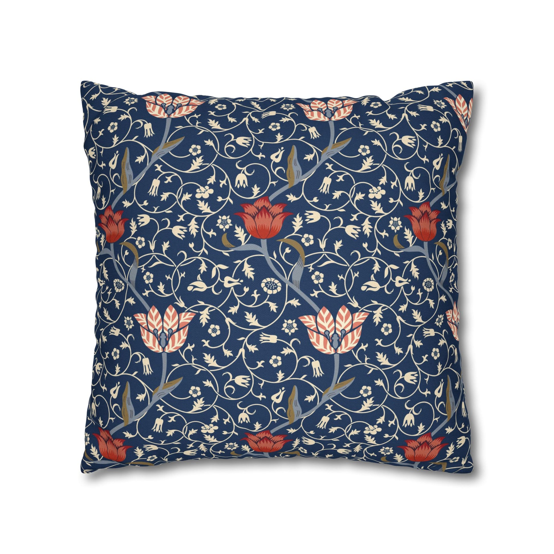 Decorative pillow with floral pattern on a blue background