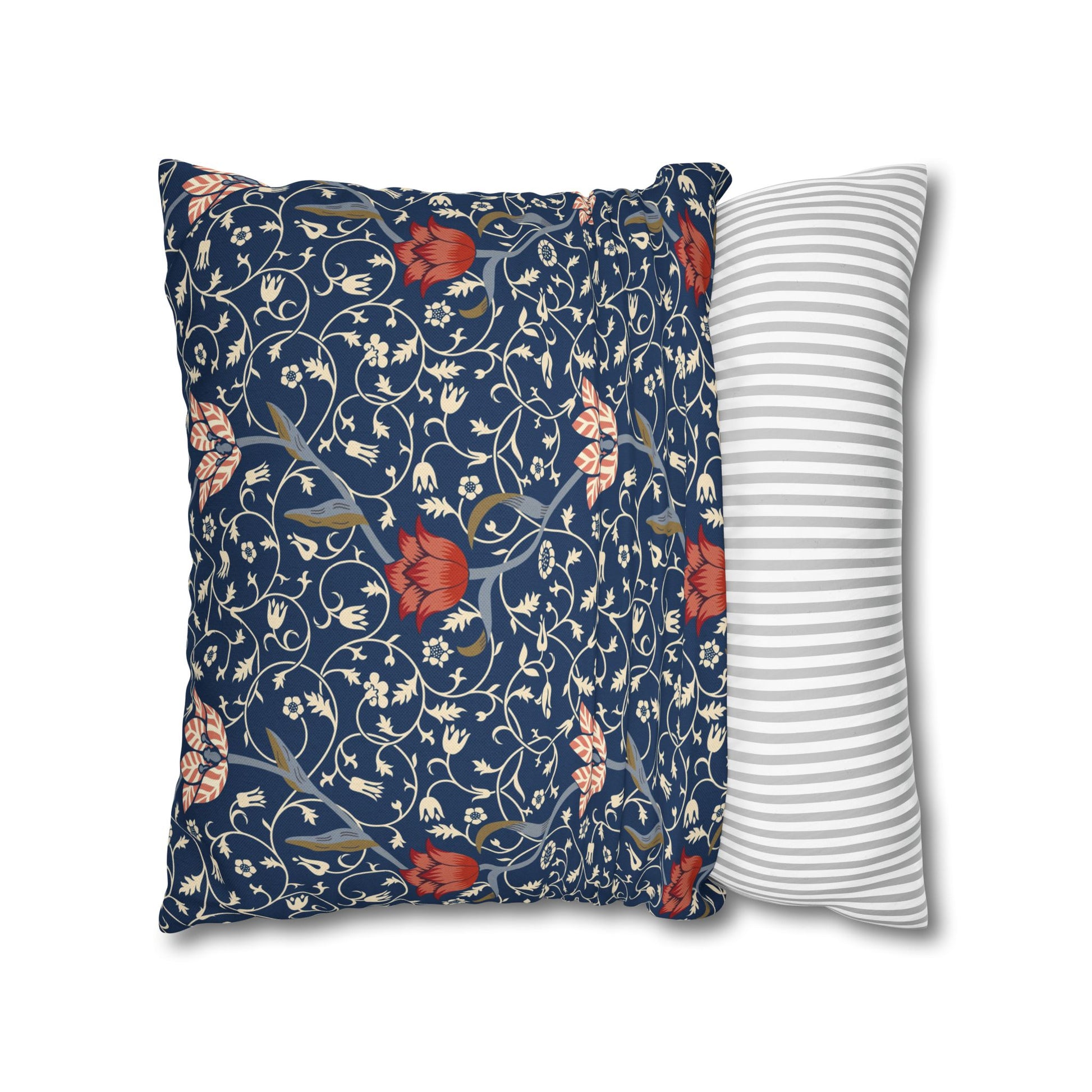 Floral-patterned pillow and a striped pillow on a white background