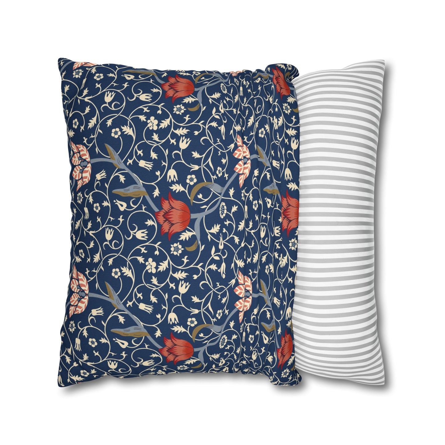 Floral-patterned pillow and a striped pillow on a white background