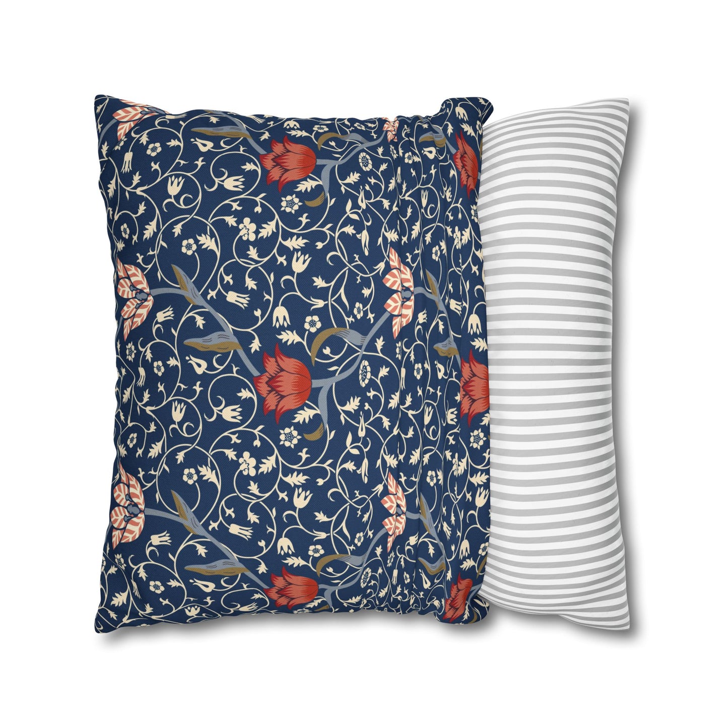 Two pillows, one with floral pattern and one with stripes, on a white background