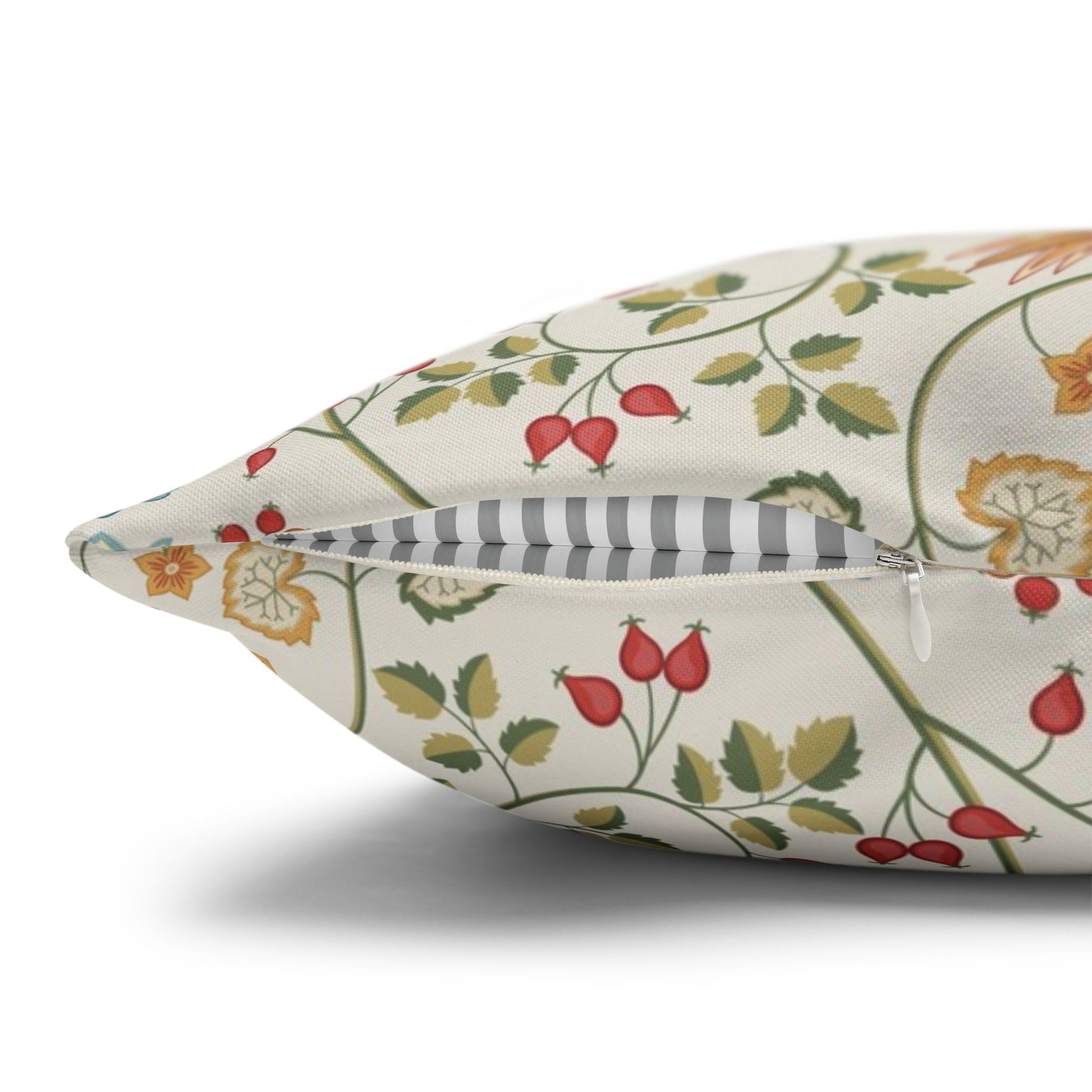 Floral-patterned pillow with a zipper on a white background