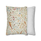 Two pillows, one with floral pattern and the other with stripes, on a white background