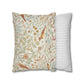 Two pillows, one with a floral pattern and the other with a striped pattern, on a white background.