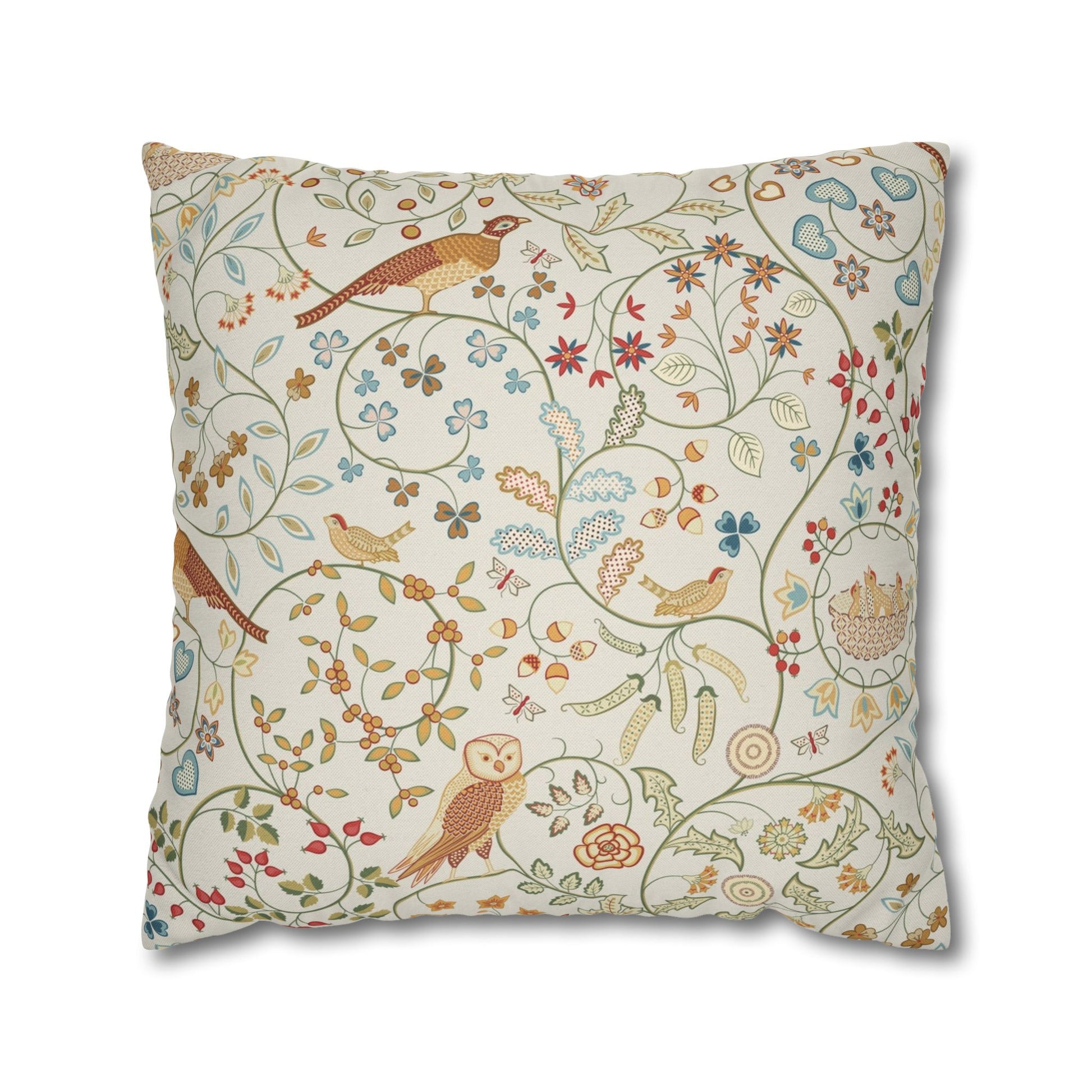 Decorative pillow with bird and floral pattern on a white background