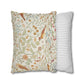 Two pillows, one with floral pattern and one with stripes, on a white background
