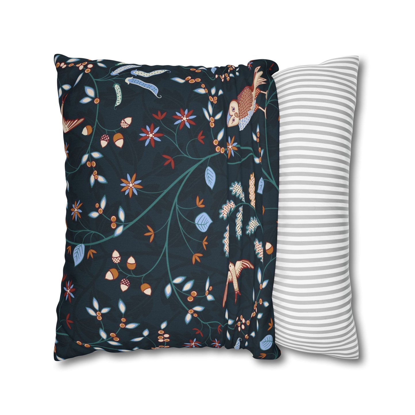 Two pillows, one with a floral pattern and the other with a striped pattern, on a white background.