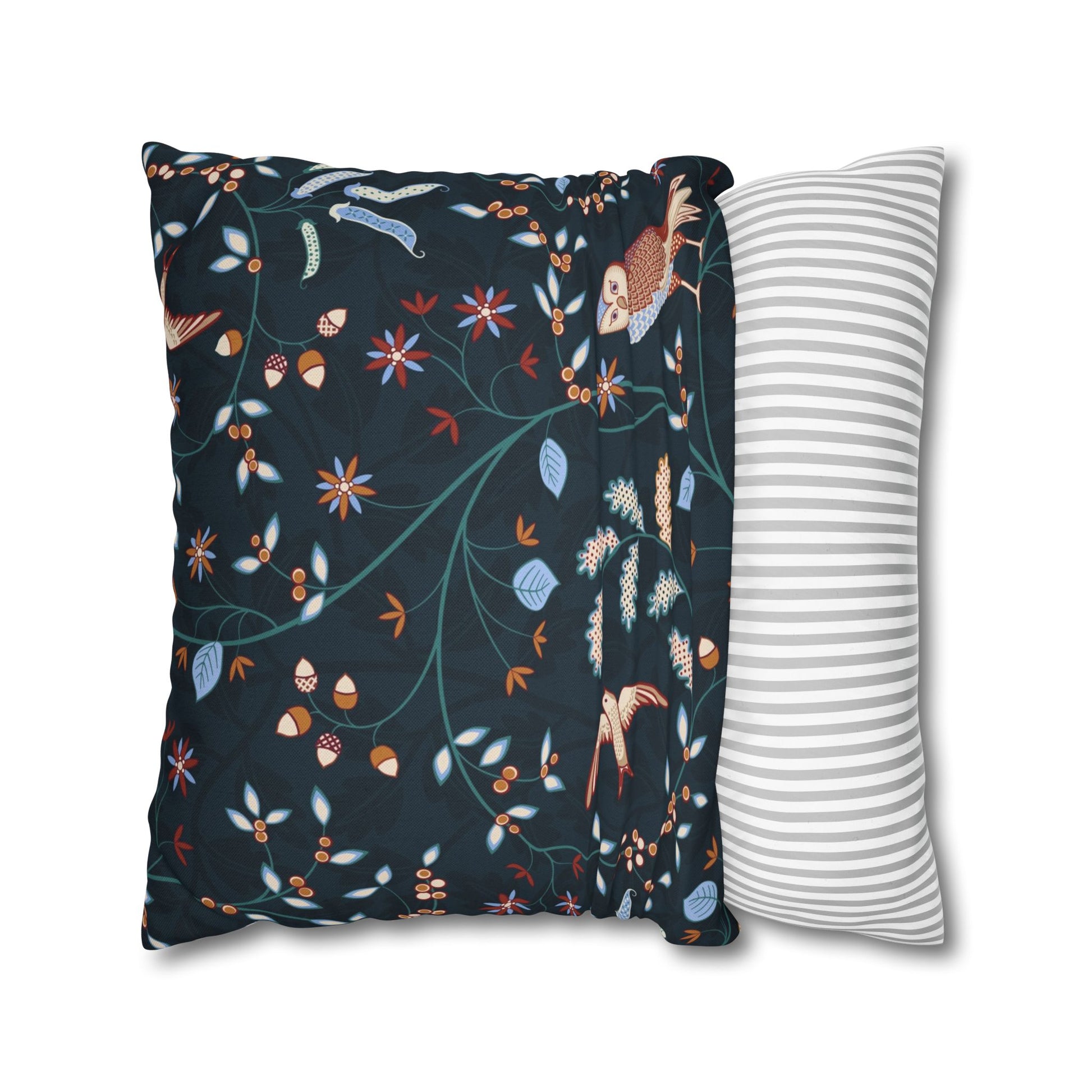 Two pillows, one with a floral pattern and the other with a striped pattern, on a white background.