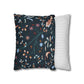 Two pillows, one with a floral pattern and the other with a striped pattern, on a white background.