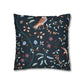 Decorative pillow with bird and floral pattern on a dark background