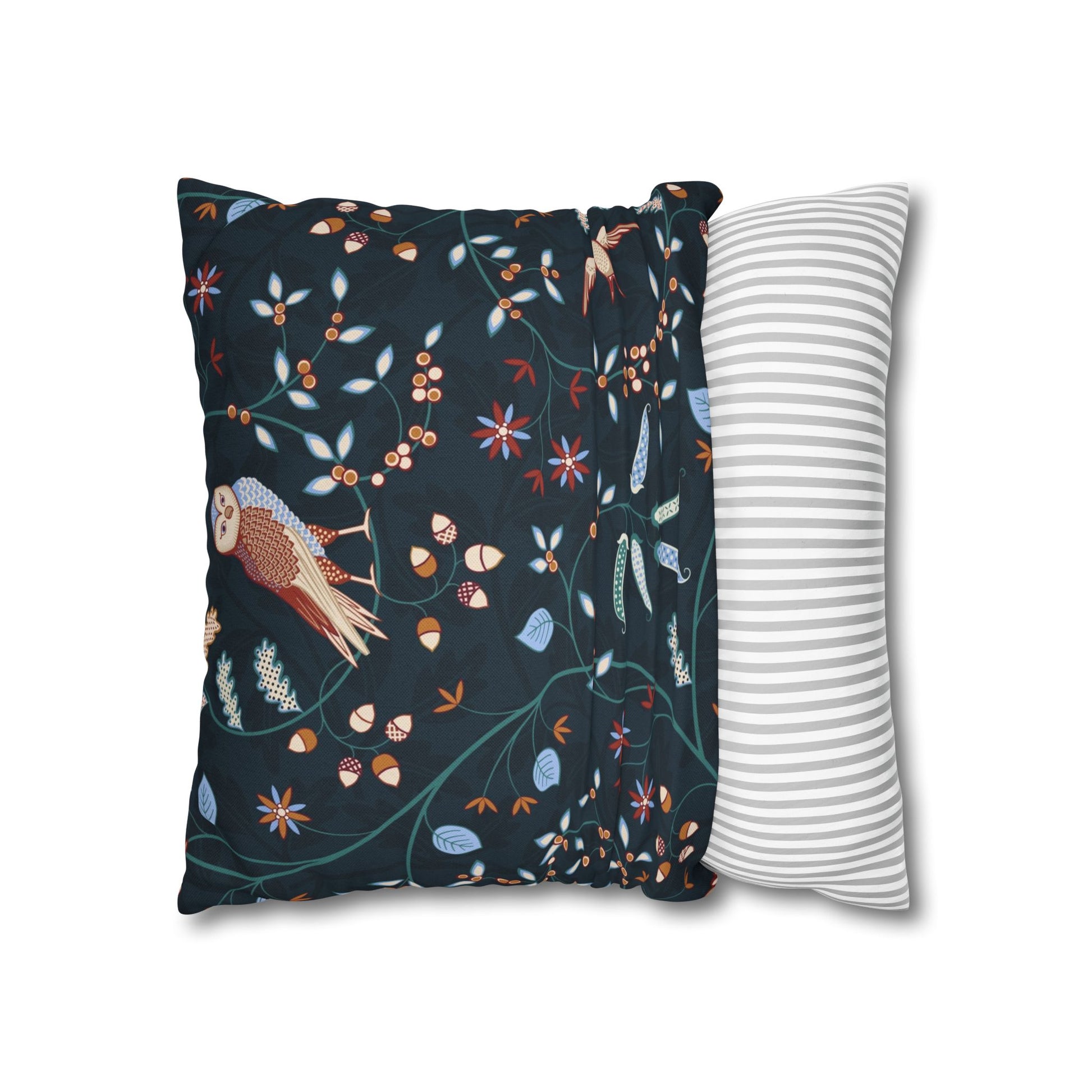 Two pillows, one with a dark floral pattern and the other with a white stripe design, on a white background.
