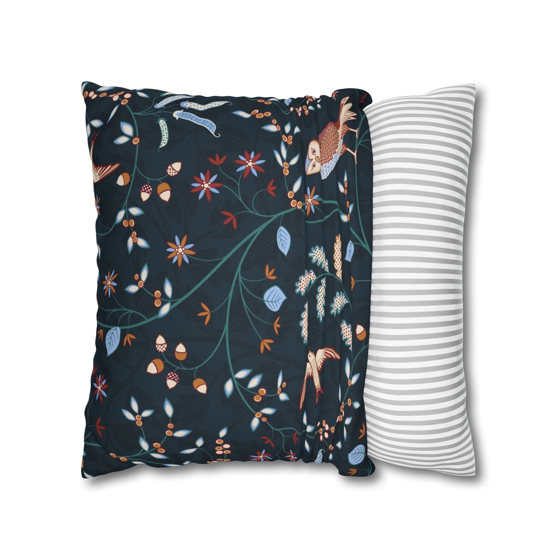 Two pillows, one with a floral pattern and the other with a striped pattern, on a white background.