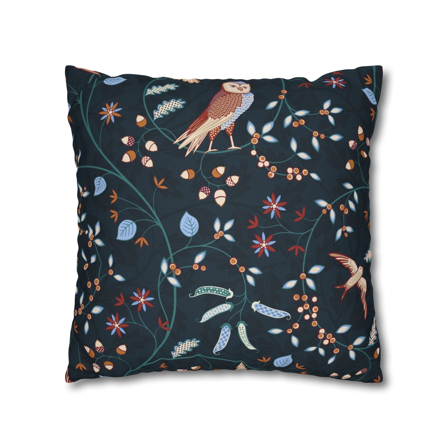 Decorative pillow with bird and floral pattern on a dark background
