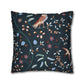 Decorative pillow with bird and floral pattern on a dark background