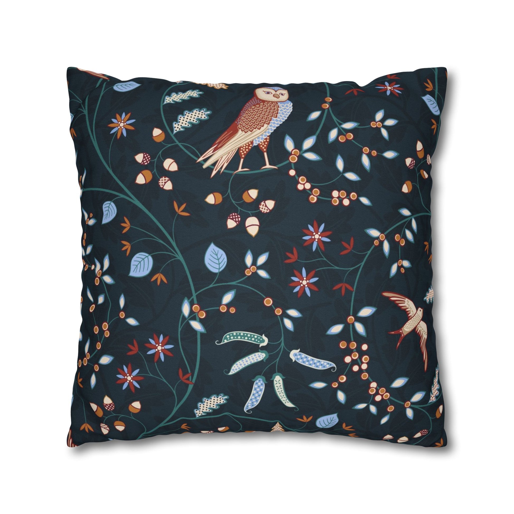 Decorative pillow with bird and floral pattern on a dark background