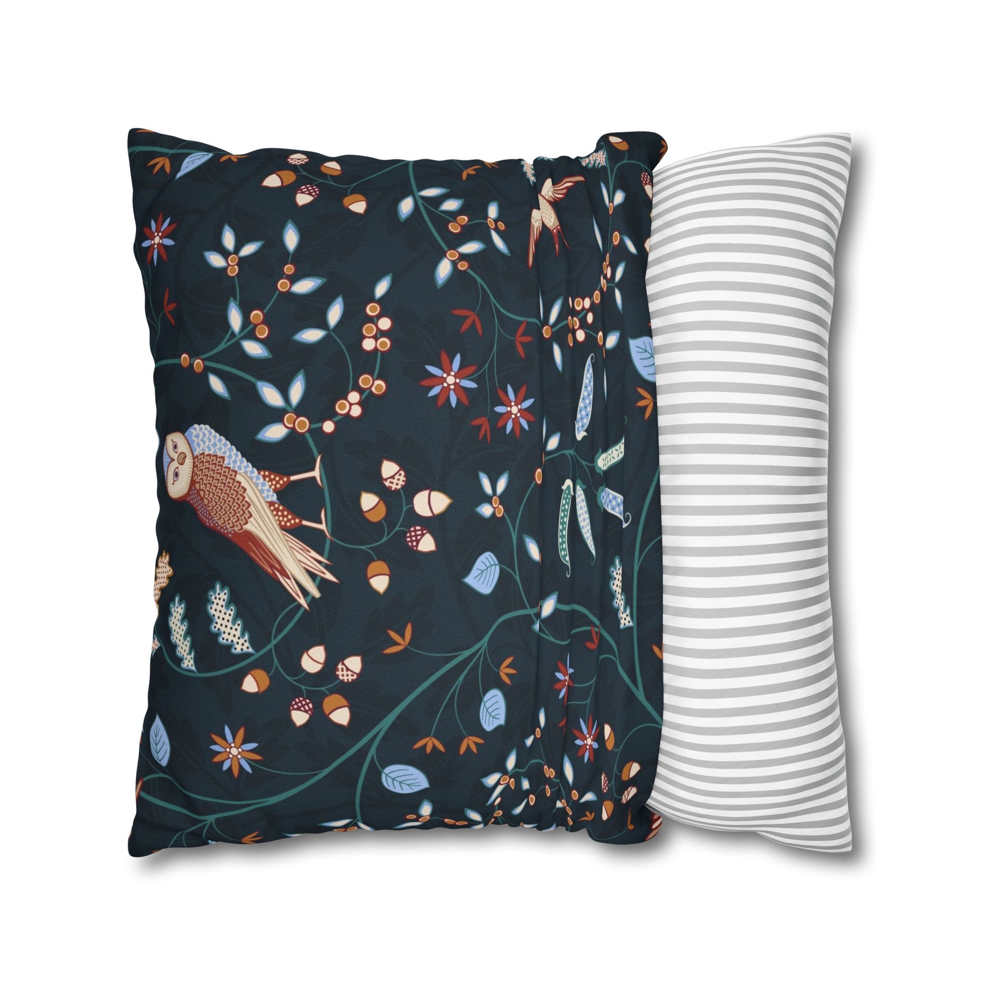 Two pillows, one with a floral pattern and the other with a striped pattern, on a white background.