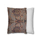Two pillows, one with floral pattern and one with stripes, on a white background