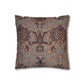 Decorative pillow with intricate floral pattern on a white background