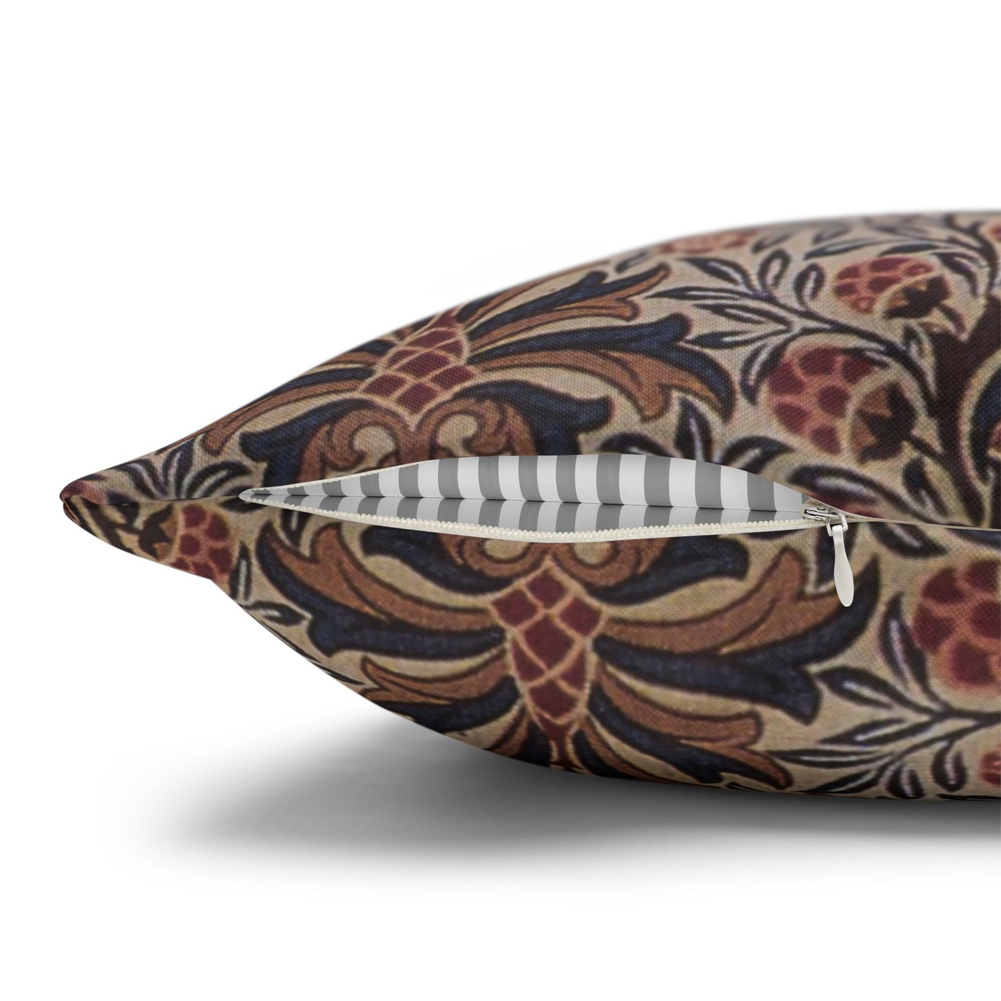 Decorative pillow with intricate pattern on a white background