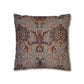 Decorative pillow with intricate floral pattern on a white background