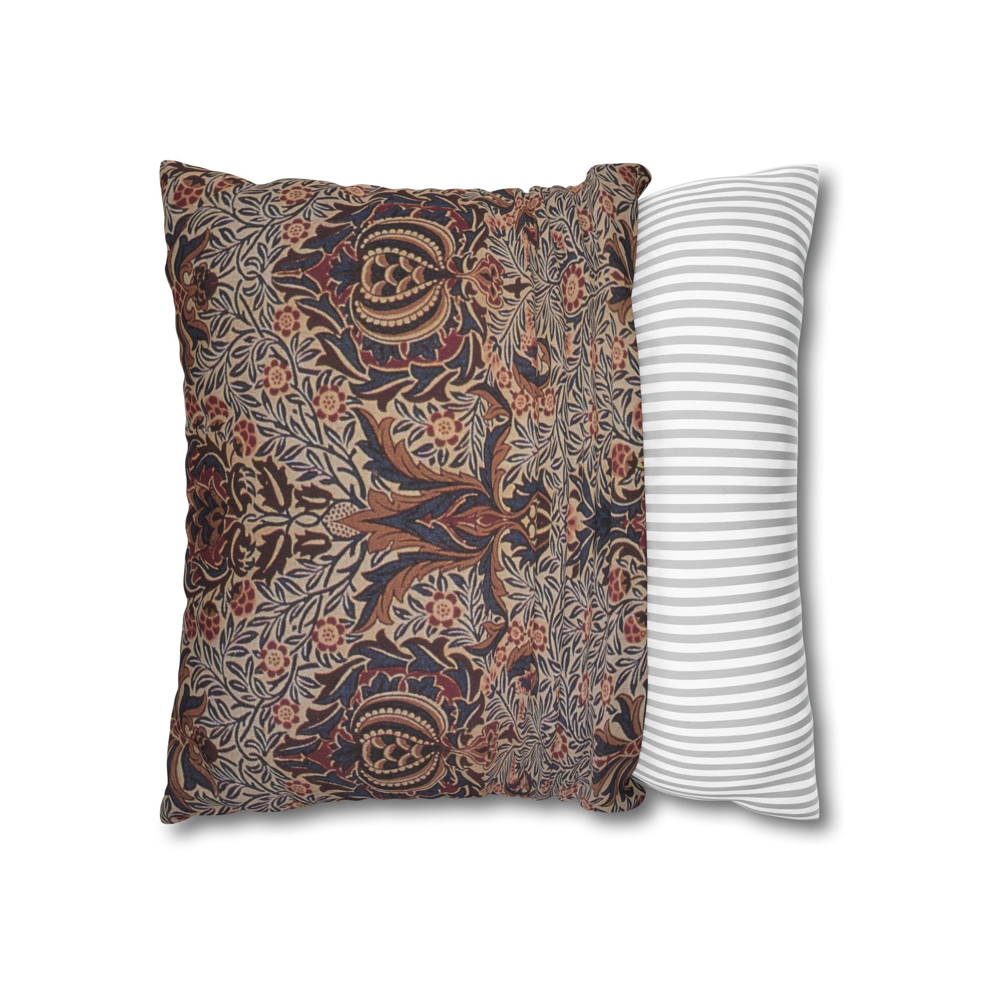 Two pillows, one with floral pattern and one with stripes, on a white background