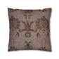 Decorative pillow with intricate floral pattern on a white background