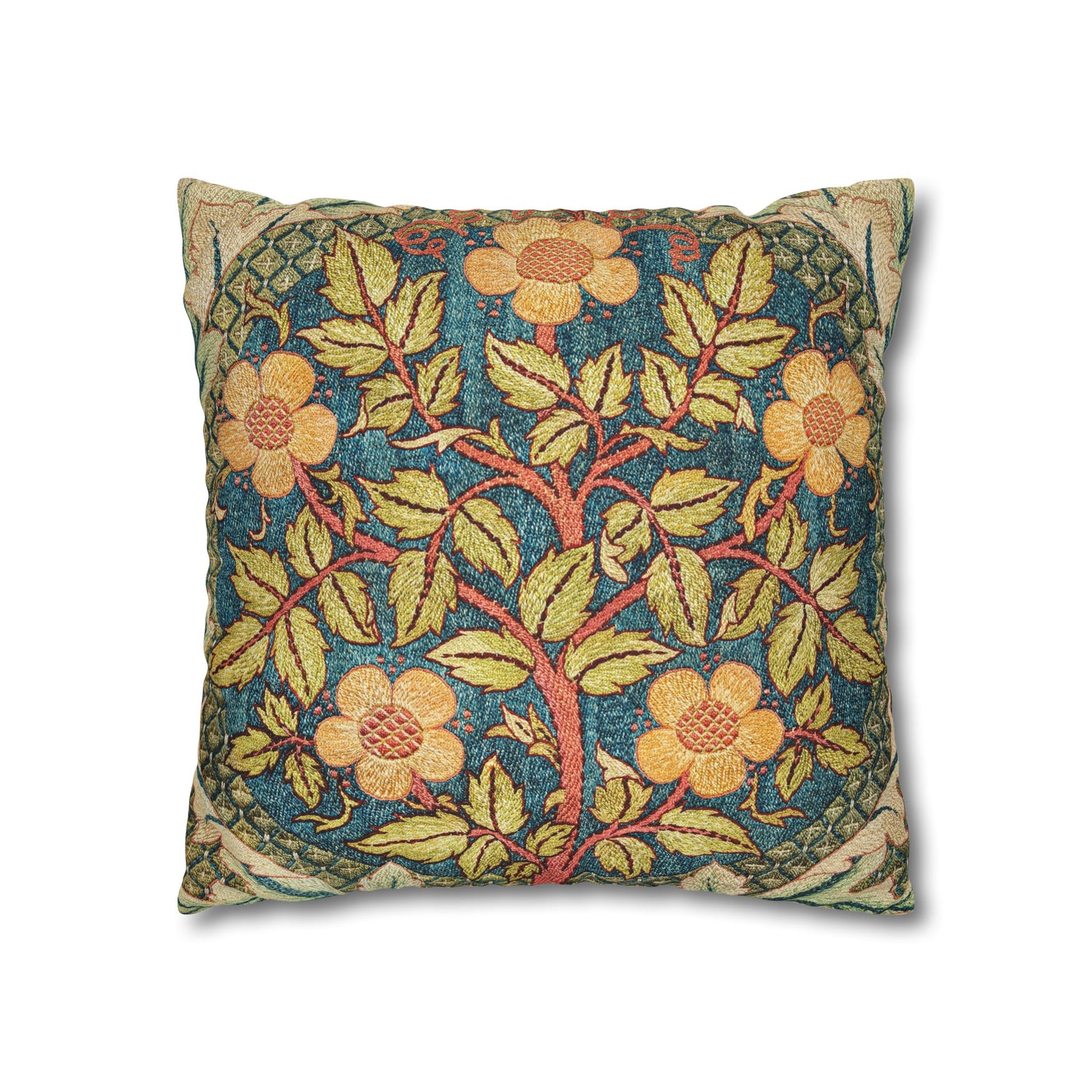 Decorative pillow with floral and tree design on a blue background