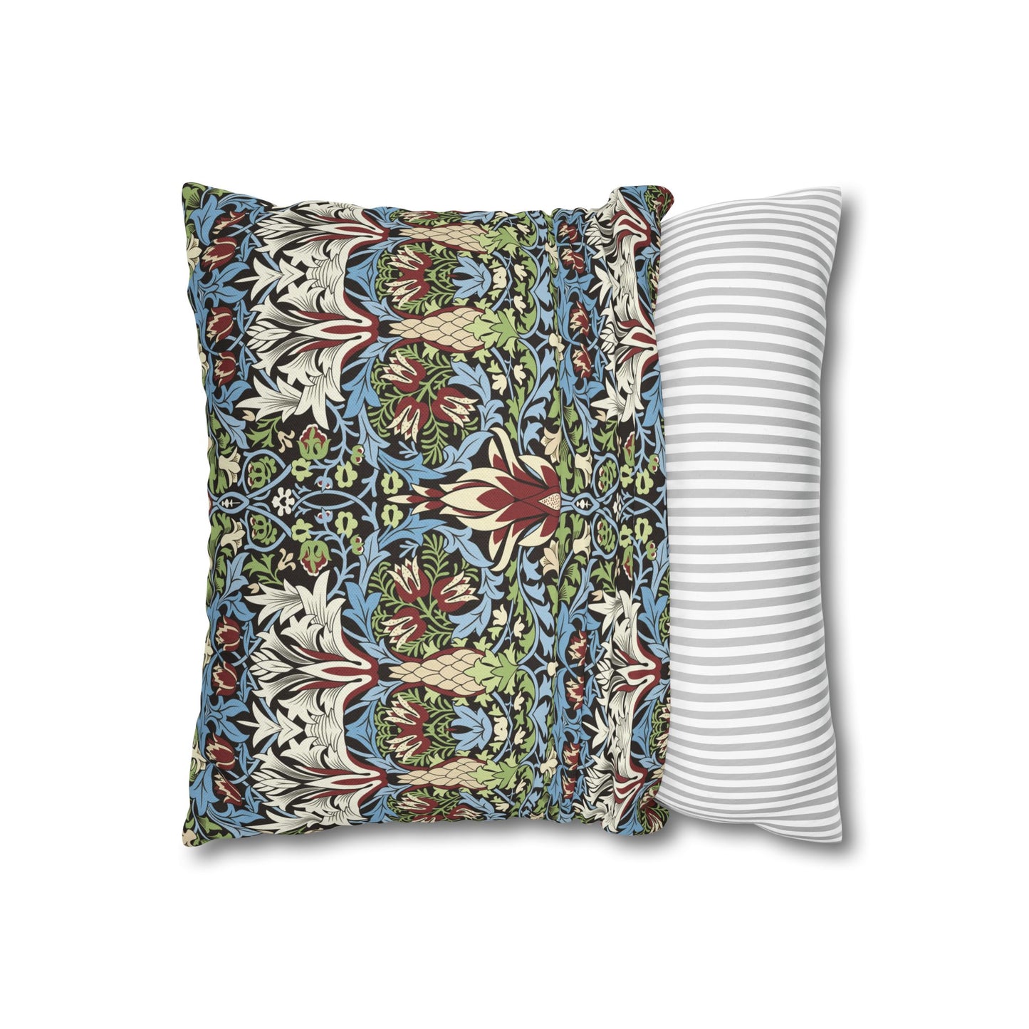 Two pillows, one with a colourful pattern and the other with a white and gray striped pattern, on a white background - William Morris Snakeshead
