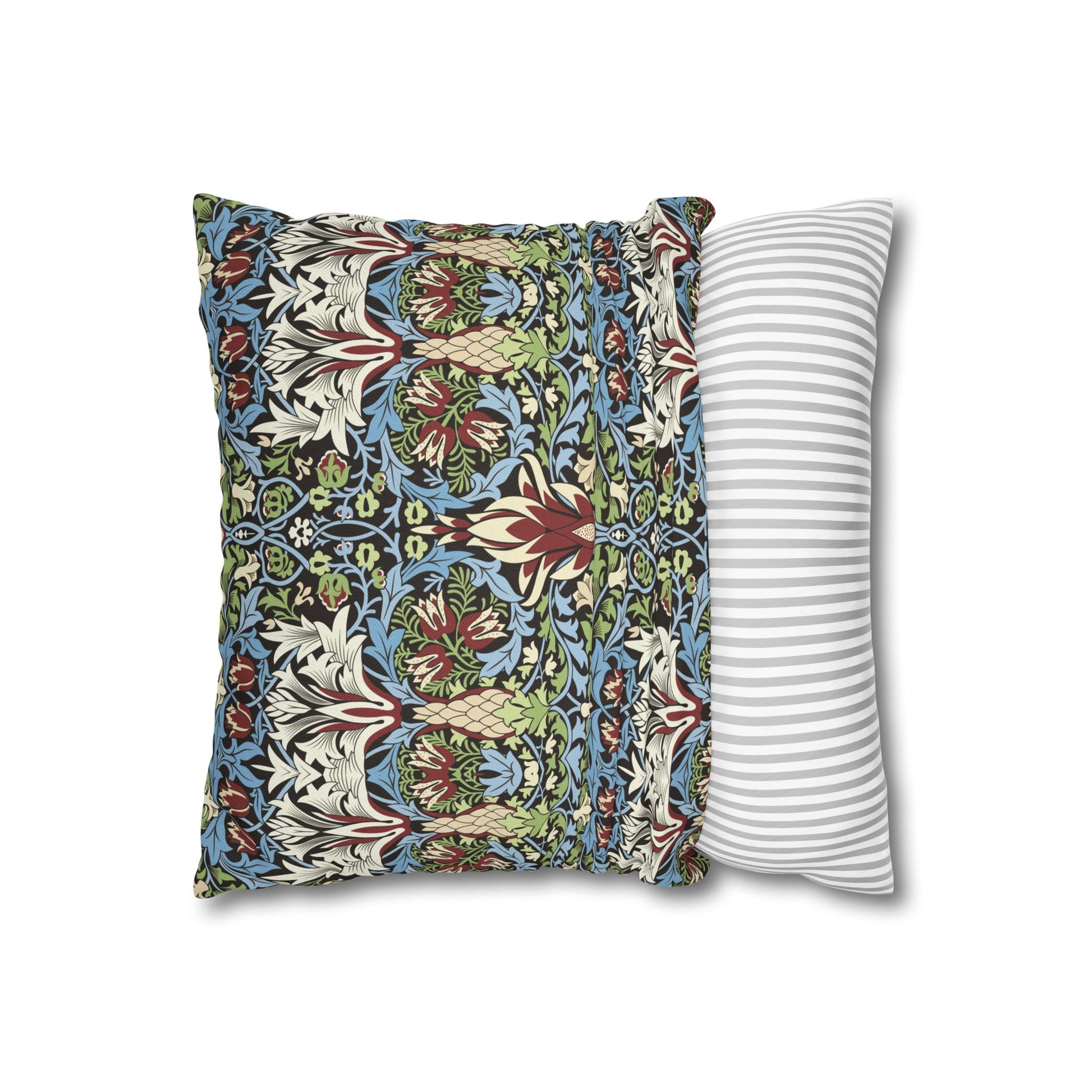 Two pillows, one with a colourful pattern and the other with a white and gray striped pattern, on a white background - William Morris Snakeshead