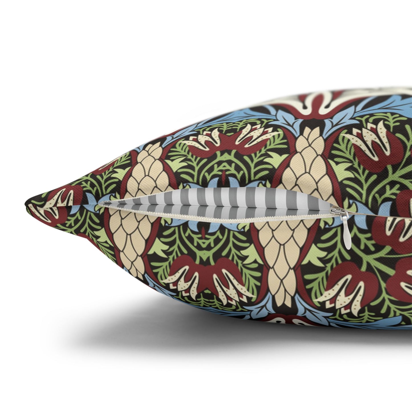 Decorative pillow with a colourful pattern on a white background - William Morris Snakeshead