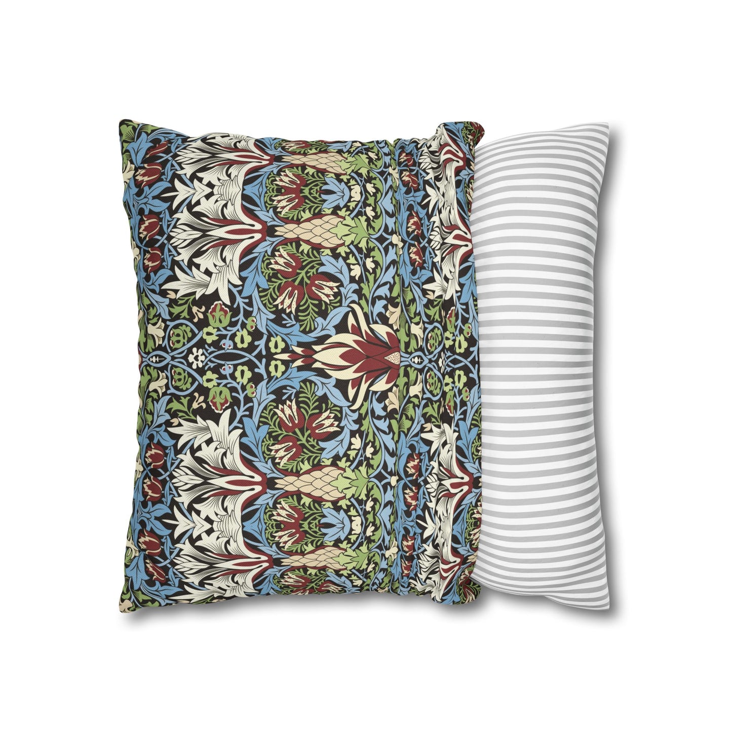 Two pillows, one with a floral pattern and the other with a striped pattern, on a white background - William Morris Snakeshead 
