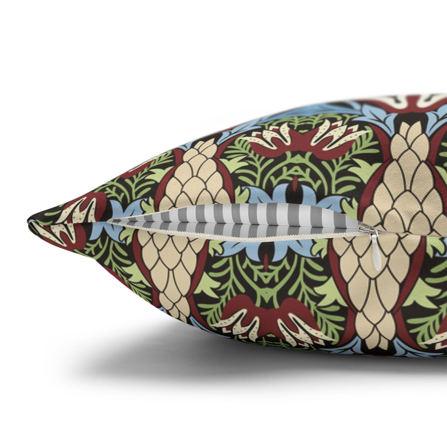 Decorative pillow with a colourful pattern on a white background  - William Morris Snakeshead