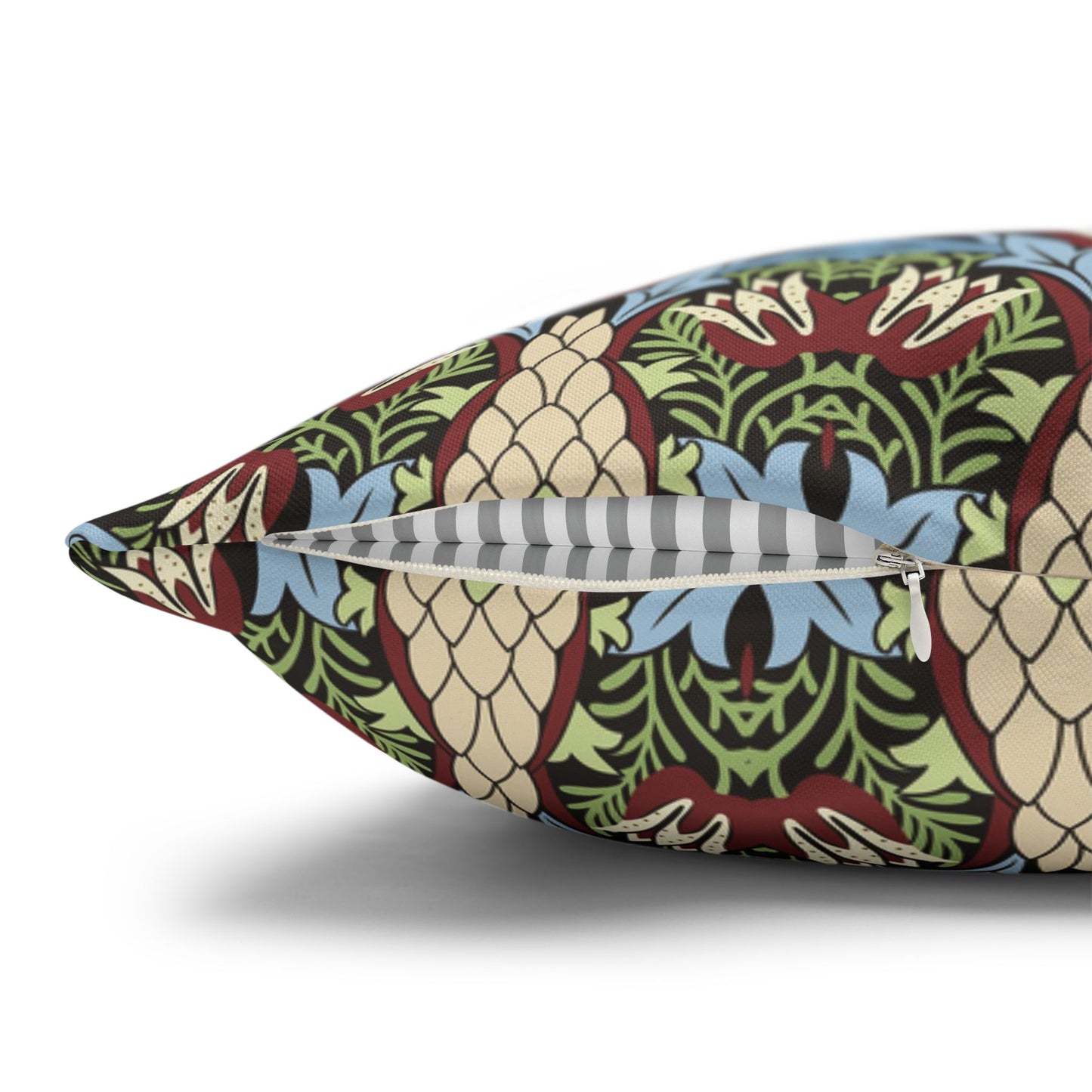Decorative pillow with a colourful pattern on a white background - William Morris Snakeshead