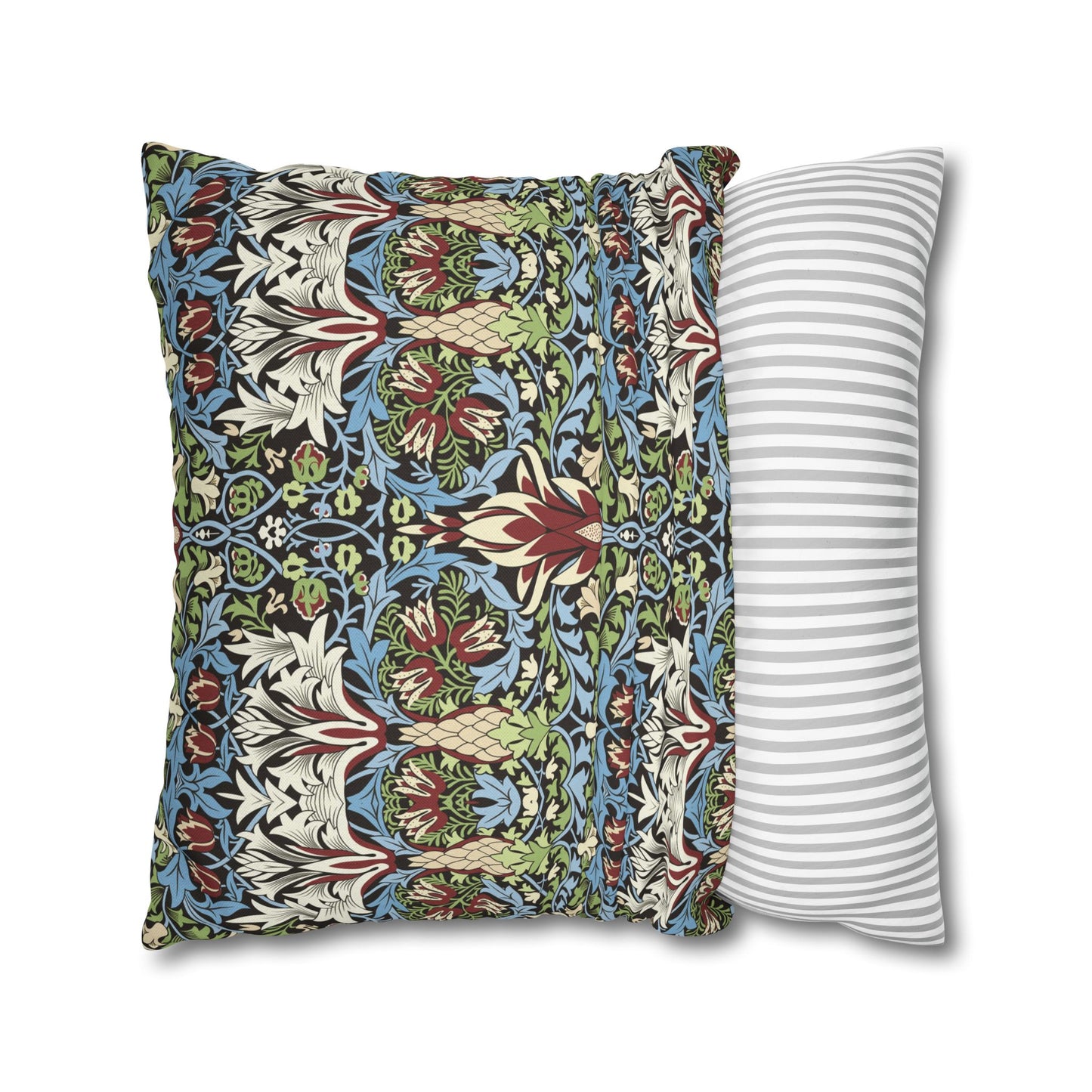 Two pillows, one with a colourful floral pattern and the other with a white and gray striped pattern, on a white background - William Morris Snakeahead