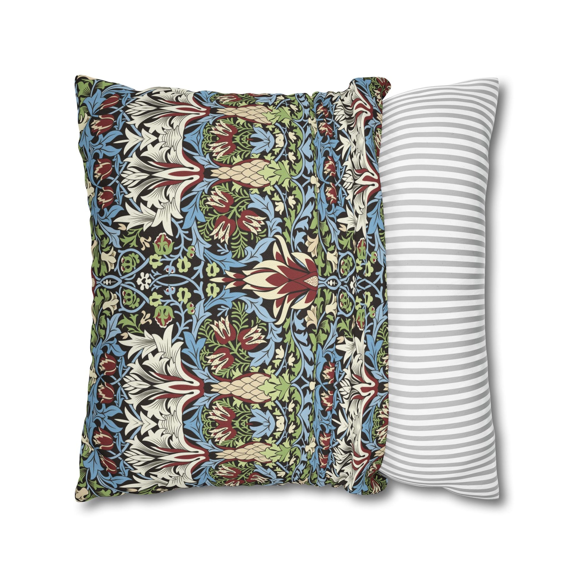 Two pillows, one with a colourful floral pattern and the other with a white and gray striped pattern, on a white background - William Morris Snakeahead