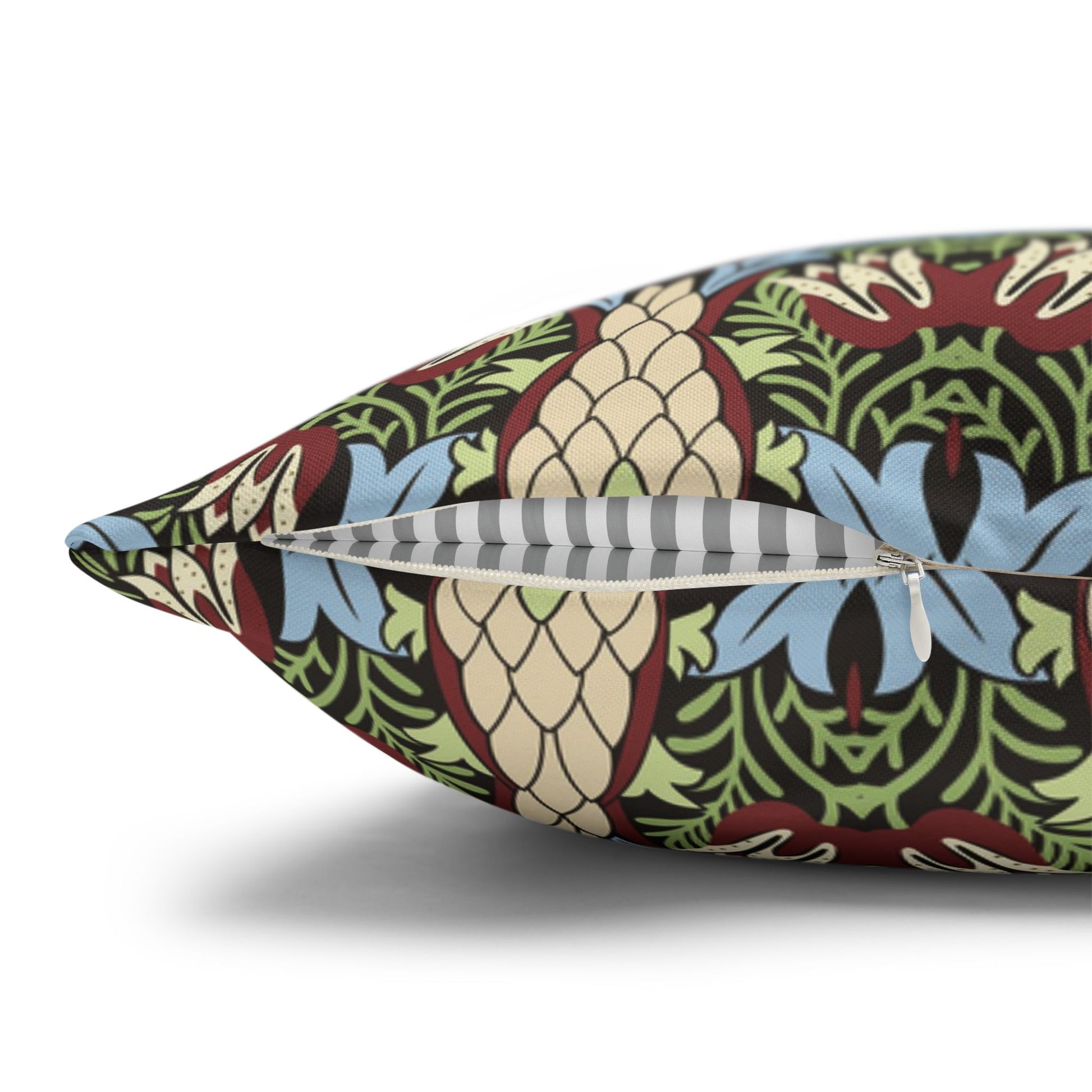 Decorative pillow with a colourful pattern on a white background - William Morris Snakeshead