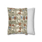 Decorative pillow with floral and lattice pattern next to a plain striped pillow on a white background