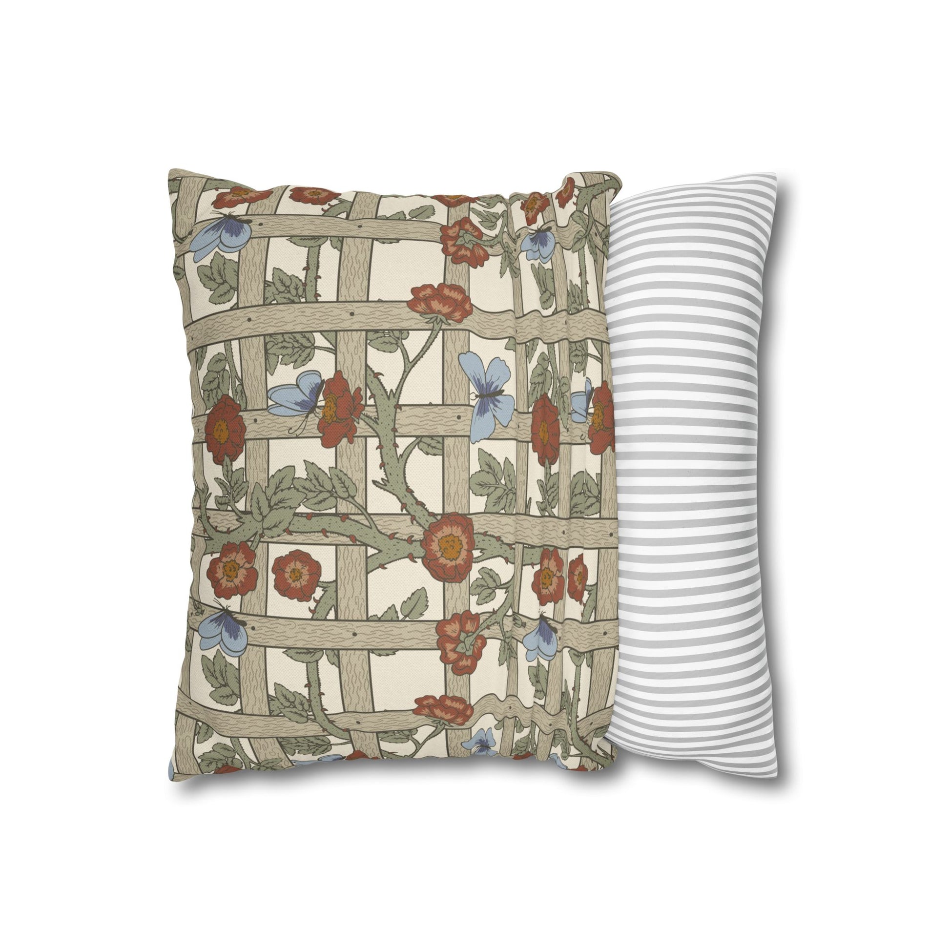Decorative pillow with floral pattern and striped pillow on a white background